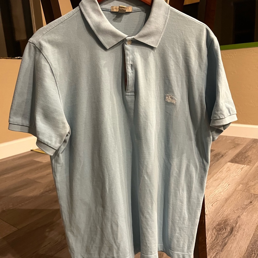 Used old style burberry polo light blue